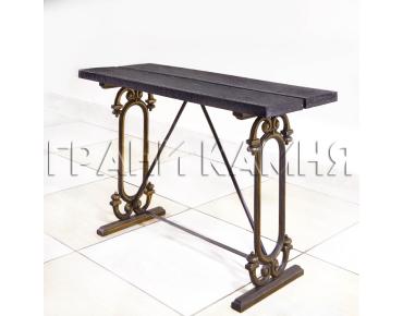 Чугунная скамейка на кладбище